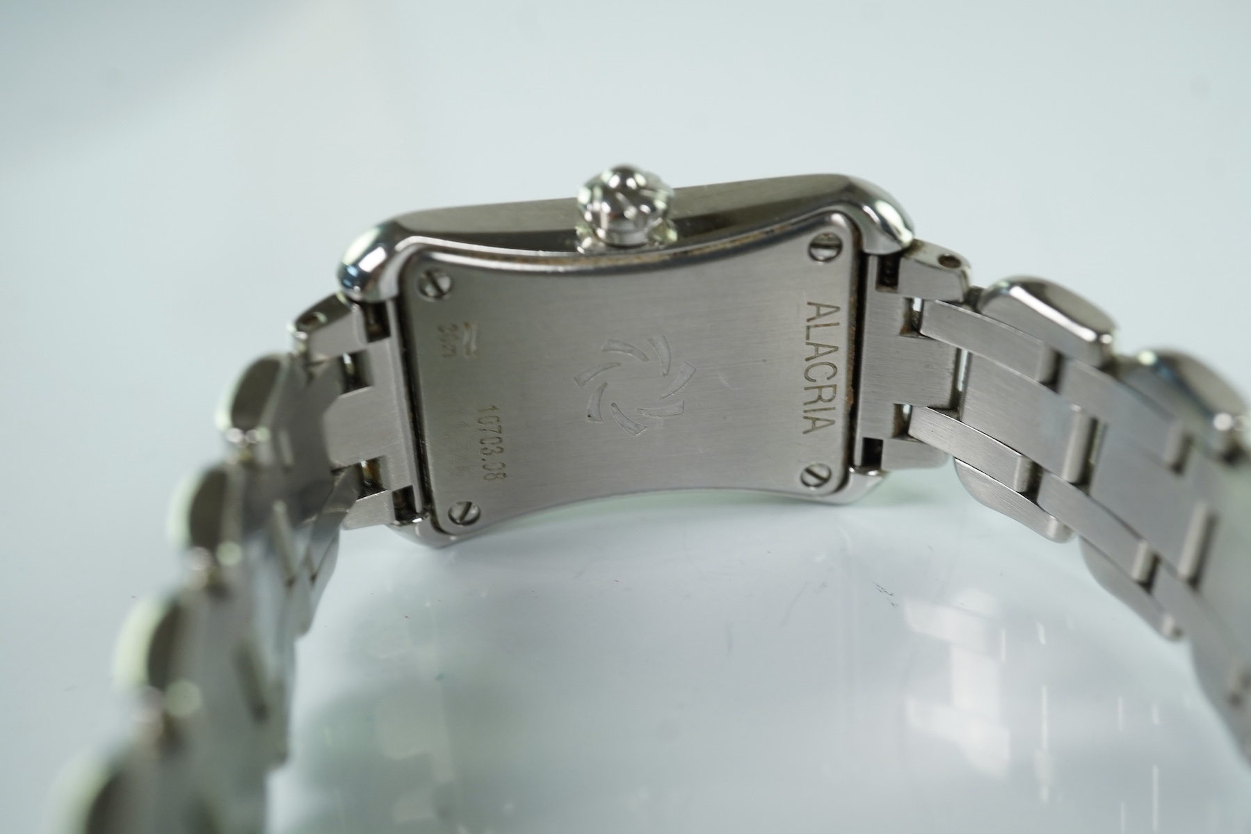 A lady's 2007 stainless steel and diamond set Carl F. Bucherer quartz wrist watch, on a stainless steel bracelet
